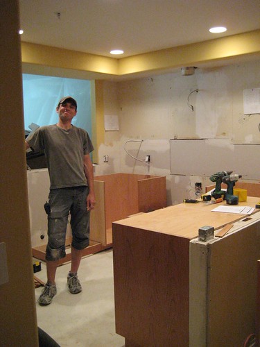Sep 11: installer/god Nick Meyer putting cabinets in