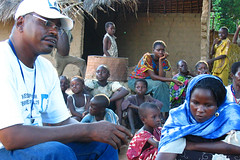 DRC humanitarian worker with the people of Paoua