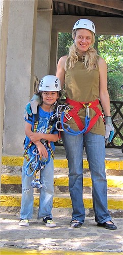 mama and son ready for a zip line in guatemala canopy tour