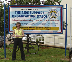 Nadine France in front of the TASO sign