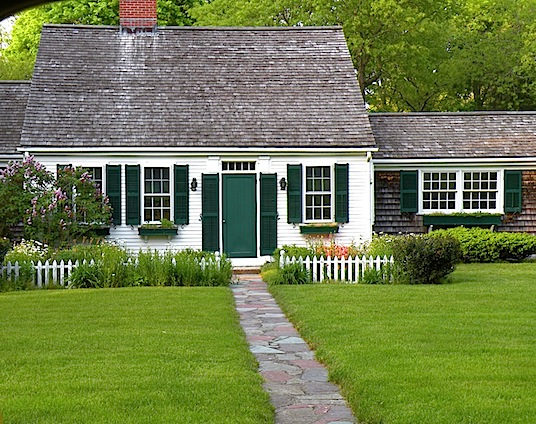 White clapboard house with green door in Osterville MA on Cape Cod