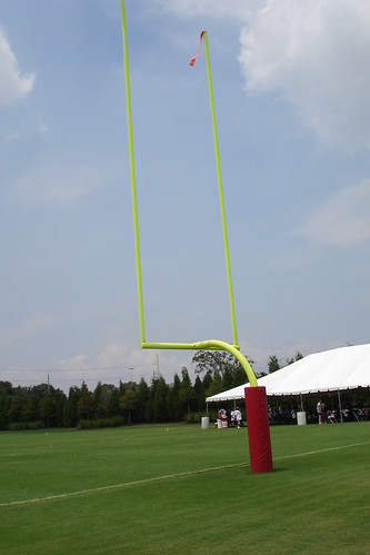 Practice goal posts for place kickers that may be five yards wide at most. In the background is the tent where Kellen Winslow spoke to his campers.