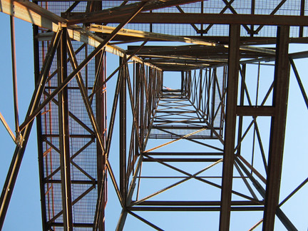 A view from the bottom of the oil derrick.