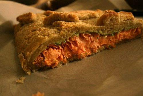 en croute - Salmon is wrapped with goat cheese, watercress, arugula, and spinach in a flaky shortcrust to make salmon en croute. Dinner is served!