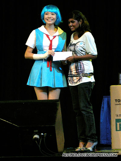 Dawn Yeoh giving out the prize for a Japanese songs singing competition