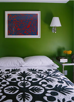 Punchy green bedroom: Black + white bedspread + colorful modern art, by Sheila Bridges