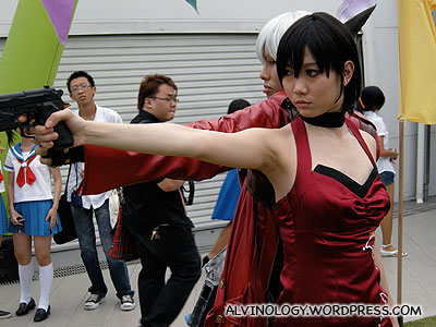 Gun wielding female cosplay character