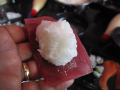 Round rice ball on Wasabi-smeared Tuna