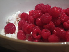 Put raspberries with broken up meringue