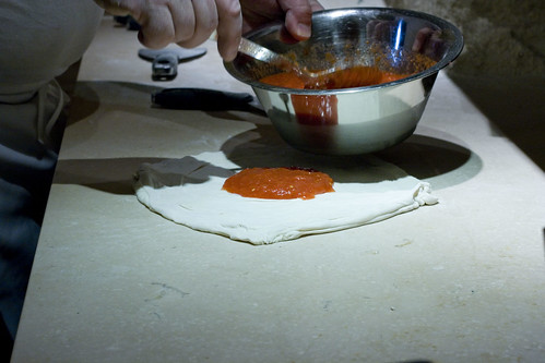 making pizza - sauce