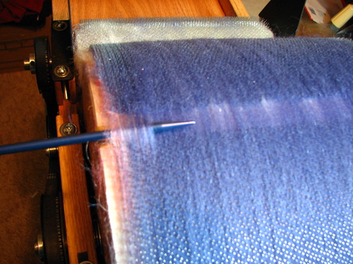 Starting to pull roving from drum carder