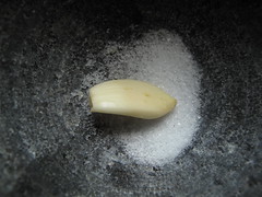 Clove of garlic and salt