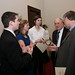 Sen. Carl Levin (D-Mich.) and Rep. Fred Upton (R-Mich.) speak with the winning team in the iOMe Challenge