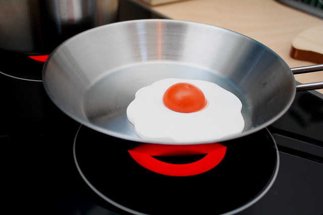 Fried egg on toy kitchen
