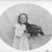 Miriam holding a chicken, Fort Lawton