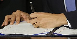 President Obama signs HCR