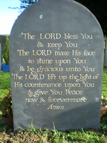 Blessing for the reader on back of gravestone