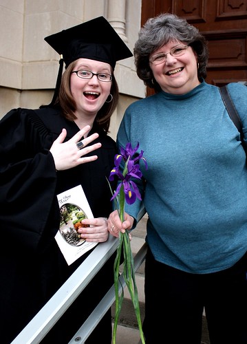 Daughter graduating college with mom