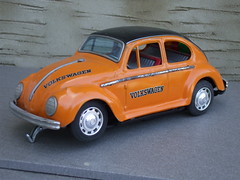 Vintage 1960's Made in Japan Orange Bump n Go Battery Operated Tinplate Volkswagen Beetle