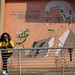 Benedictte by a mural to the Freedom Charter in Kliptown, Soweto, South Africa. • <a style="font-size:0.8em;" href="http://www.flickr.com/photos/50948792@N02/14210541160/" target="_blank">View on Flickr</a>