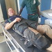 Steve on the bare metal gurney in triage at Mazabuka District Hospital, Zambia • <a style="font-size:0.8em;" href="http://www.flickr.com/photos/50948792@N02/14660371473/" target="_blank">View on Flickr</a>