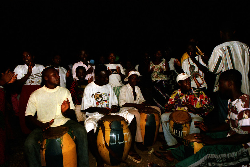 Togo West Africa Ethnic Cultural Dancing and Drumming African Village close to Palimé formerly known as Kpalimé a city in Plateaux Region Togo near the Ghanaian border 24 April 1999 127<br/>© <a href="https://flickr.com/people/41087279@N00" target="_blank" rel="nofollow">41087279@N00</a> (<a href="https://flickr.com/photo.gne?id=14007582503" target="_blank" rel="nofollow">Flickr</a>)