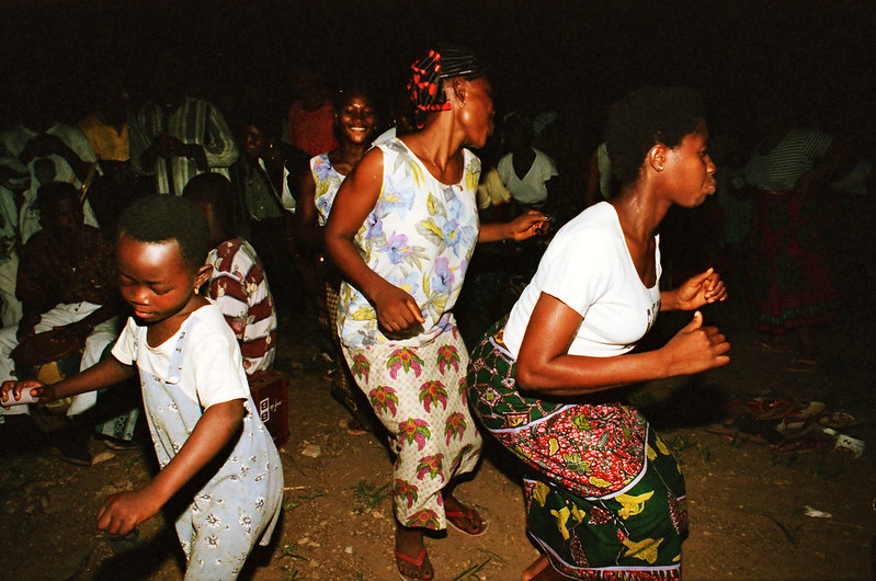 Togo West Africa Ethnic Cultural Dancing and Drumming African Village close to Palimé formerly known as Kpalimé a city in Plateaux Region Togo near the Ghanaian border 24 April 1999 164<br/>© <a href="https://flickr.com/people/41087279@N00" target="_blank" rel="nofollow">41087279@N00</a> (<a href="https://flickr.com/photo.gne?id=14016367055" target="_blank" rel="nofollow">Flickr</a>)