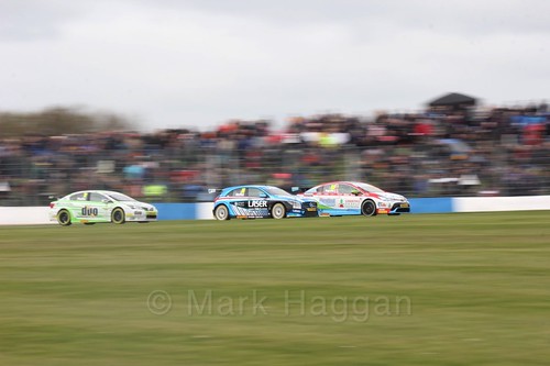Rob Austin, Aiden Moffat and Tom Ingram in race one at the British Touring Car Championship 2017 at Donington Park