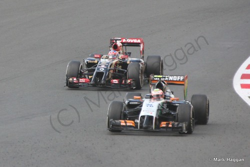Romain Grosjean and Nico Hulkenberg during The 2014 British Grand Prix