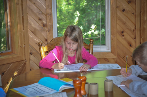 Nora working on handwriting • <a style="font-size:0.8em;" href="http://www.flickr.com/photos/96277117@N00/14391821629/" target="_blank">View on Flickr</a>